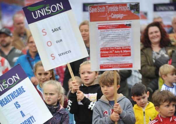 South Tyneside Hospital campaigners march and rally against cuts to hospital services.