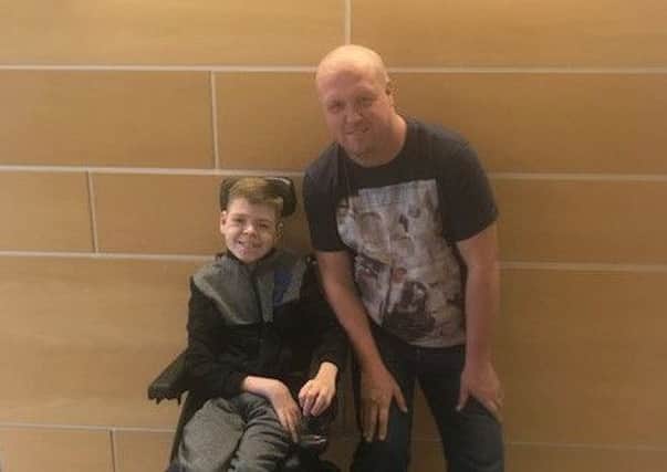 Dylan Marshall with taxi driver Darren Murphy