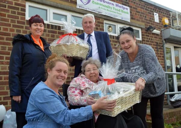 Hebburn Court Nursing Home food donations to Hebburn Helps
From left Hebburn Helps Angie Comerford care home resident Sandra Smallcombe and Jo Durkin 
Back, care home wellbeing co-ordinator Theresa Moor and manager Kevin Mulvey
