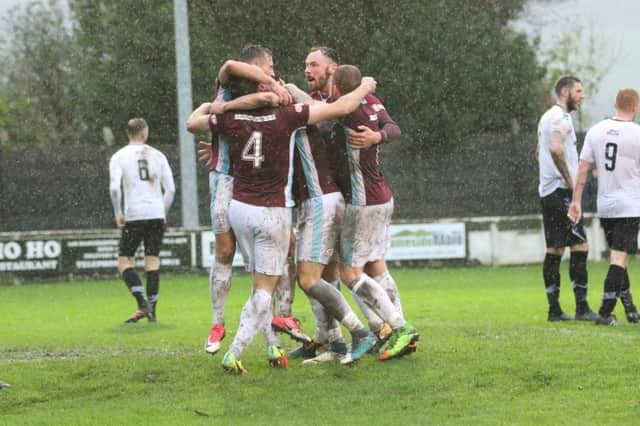 South Shields celebrate Jamie Holmes' dramatic late winner at Mossley last week. Picture by Peter Talbot.