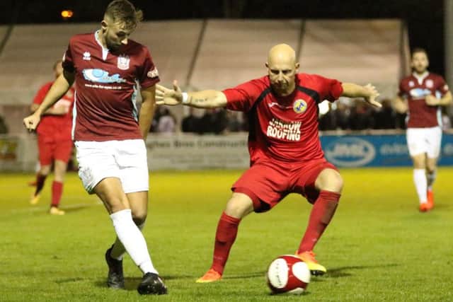 Jamie Holmes takes on Jarrow Roofing last night. Picture by Peter Talbot