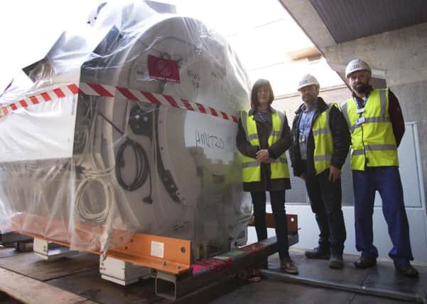 South Tyneside NHS Foundation Trust business manager Bronia Fleet, with senior engineer Diego Peralta, and MRI lead Miles Weston.