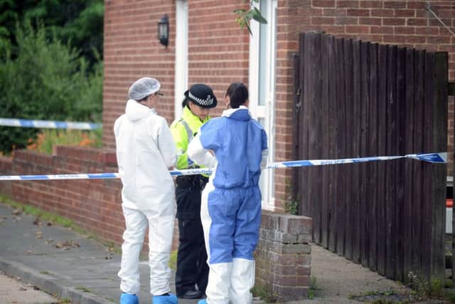 Police officers at the scene of the killing in Church View, Boldon Colliery. The body of Gemma Finnigan was discovered in an upstairs flat.