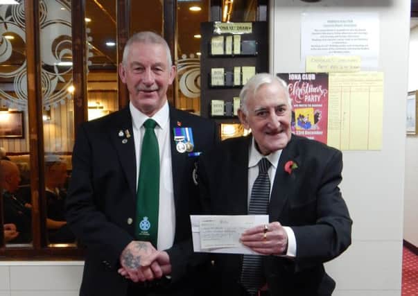 John Houston, left, and treasurer of the Iona Social Club Tommy Bamford.