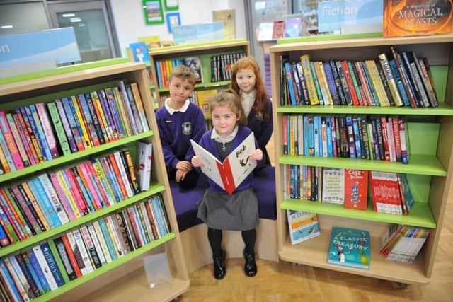 Hebburn Lakes Primary School pupils James McFadyen, Ella Barron and Ella Gibson in their new school library.