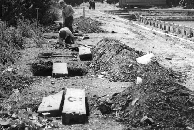 Workmen busy on the foundations of the new stand at Simonside Hall in July 1957.