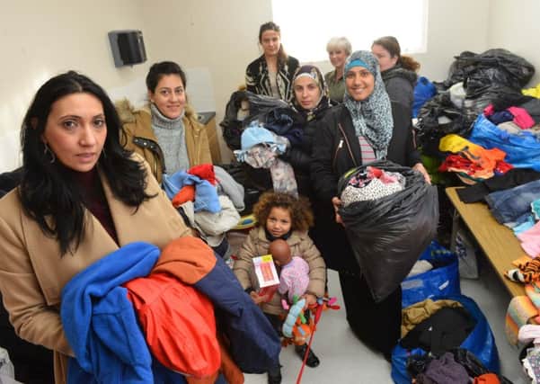 CREST's mentor a mum project appeal for clothing and food donations.
Front, projects Hoda Darawsha