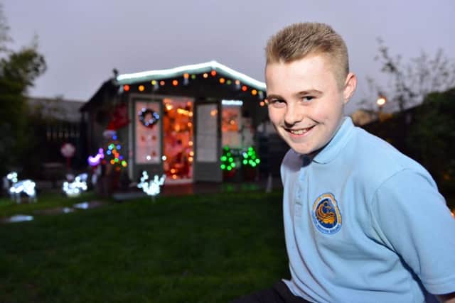 Dylan Simpson outside of his Christmas Grotto. Picture by FRANK REID