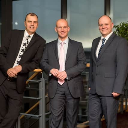 (from left) Fraser Thomson, Fairstone finance director Scott Hopkinson and Fraser McPhate