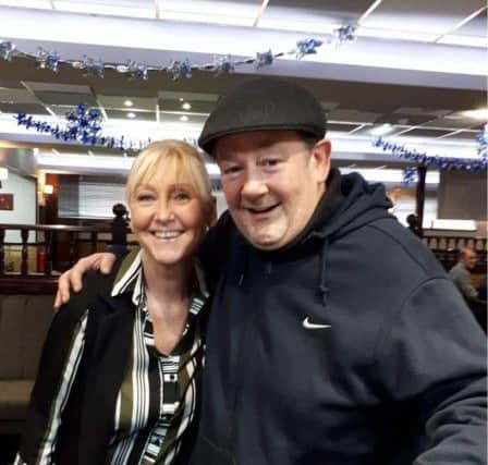Johnny Vegas with barmaid Wendy Pick at the Iona Club.