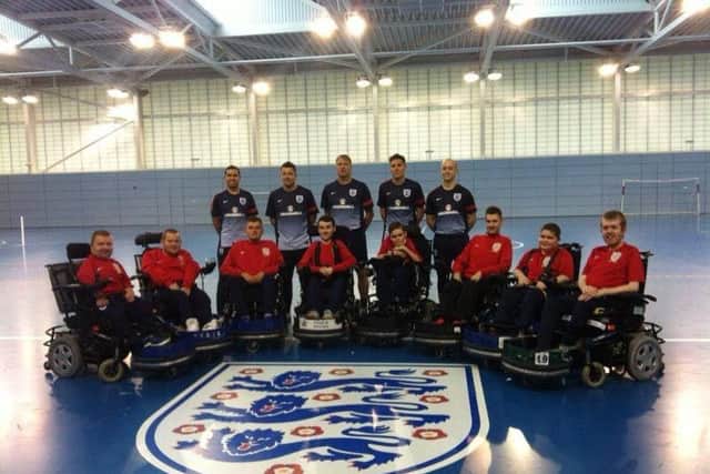 Harry Boddy with the England team and staff at an England training camp at St George's Park in Burton last year.