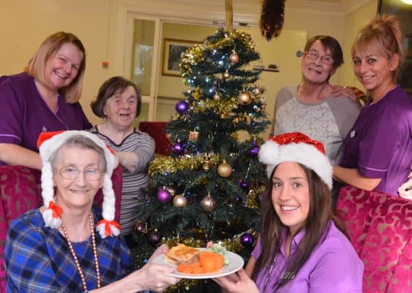 Palmerdene Care Home annual elderly Christmas day dinner invite. From from left resident Beryl Overton and deputy manager Megan Graves. Back from left staff Wendy Egglestone, resident's Evelyn Keedy and Mary Jordan with staff Janices Potts.