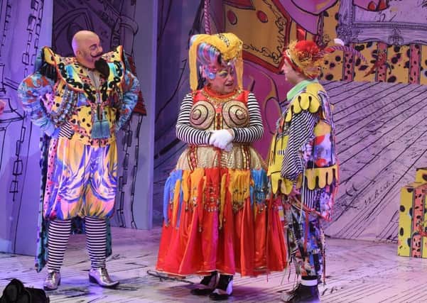 Gareth Hunter on stage as The Sultan, with Ray Spencer as Dame Bella Ballcock and David John Hopper as Arbuthnot.