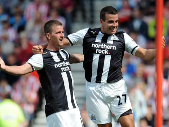 Ryan Taylor, left, and Steven Taylor celebrate a goal against Sunderland