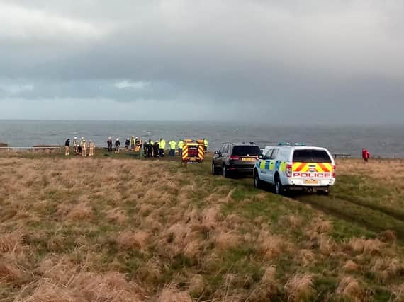 Emergency services at cliffs in Marsden as they carry out a rescue operation.