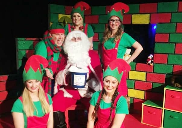 The cast of Santas Naughty Elf: A Christmas Carol are raising money for the with bucket collections at the end of performances.