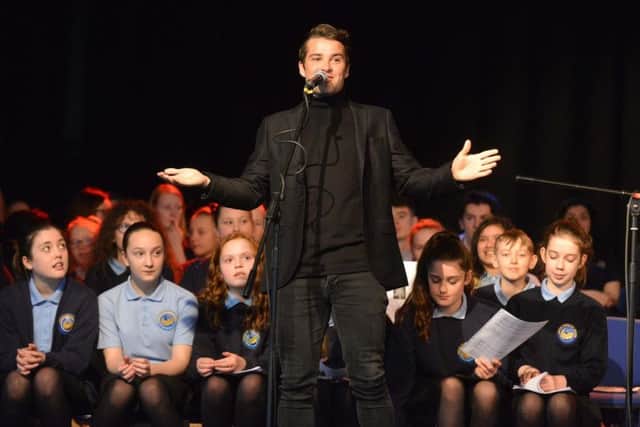 Joe McElderry visits his old school as they prepare for the annual Christmas concert