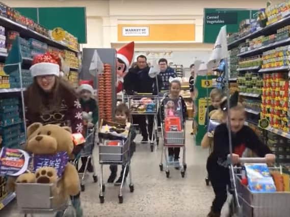 Dashing through the aisles. Picture: Jarrow Morrisons on YouTube.