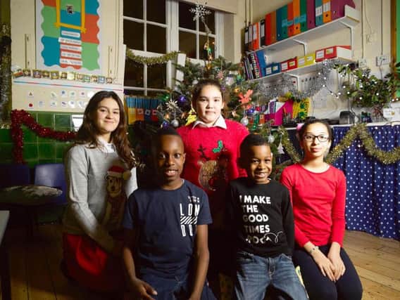 Photo issued by Channel 4 of children who survived the Grenfell tower blaze (from the left) Luana, Amiel, Megan, Danel and Hayam, who will urge viewers to "love and cherish your family" as they deliver this year's alternative Christmas message