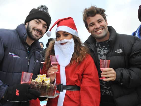 Jade Thirwall , centre, and Joe McElderry, right, took part in the Boxing Day dip for Cancer Connections.