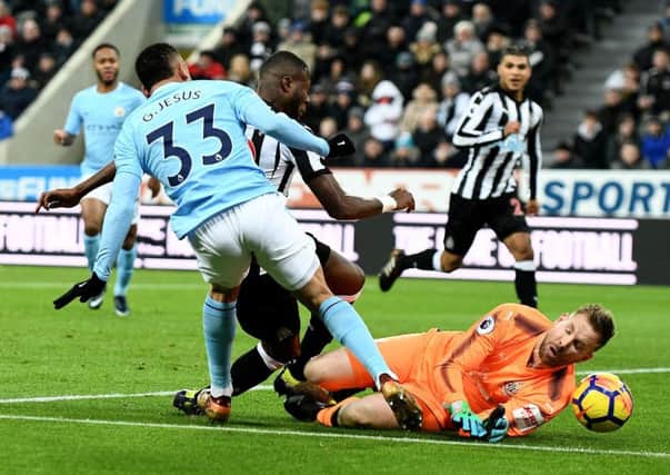 Newcastle United keeper Rob Elliot saves at the feet of Gabriel Jesus.