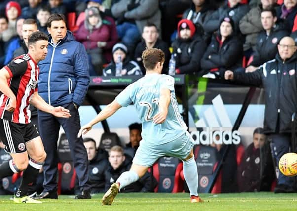 Chris Coleman watches at Bramall Lane.