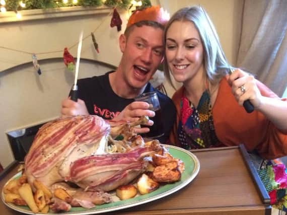 Kirsten Shore and her husband Dan with their Christmas dinner.