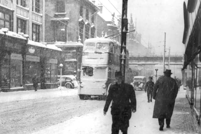 A blizzard descends on King Street, South Shields, in 1950.