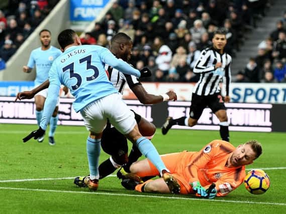 Rob Elliot against Man City