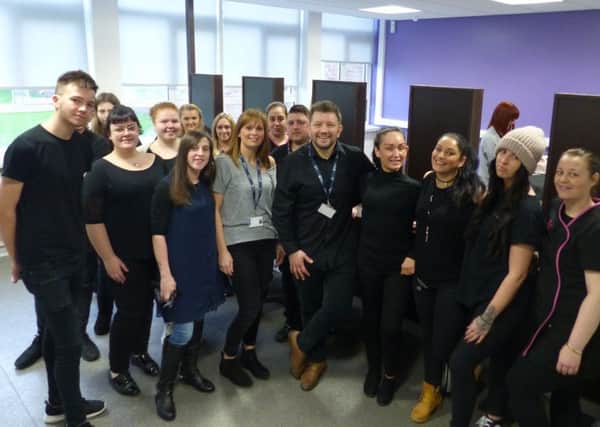 South Tyneside College barbering lecturers Donna Easton and Allan Stone, centre, with students in the new-look facilities.