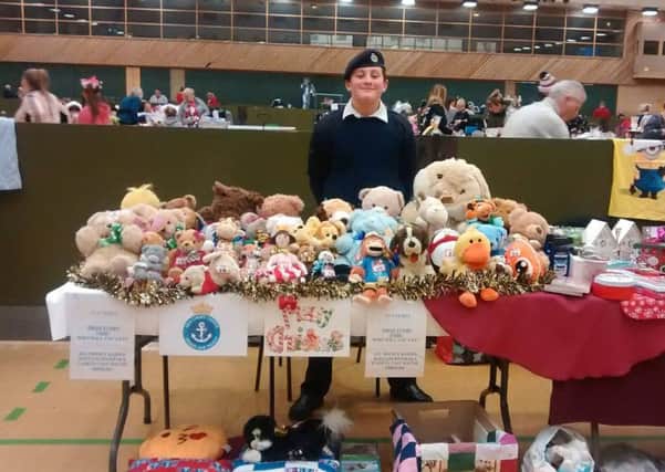 South Shields Sea Cadet Rhys Simpson with his stall at the fair held at Temple Park Leisure Centre.