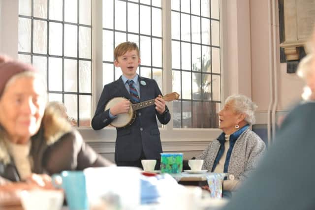 James Bassett plays a surprise performance for Jean MacDonald at St Hilda's Church, after she missed out on the Freemasons Christmas Party.