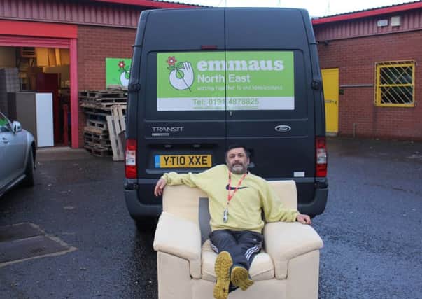 Emmaus companion Vinni with one of the sofas