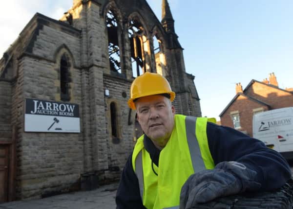 Brian Cairns the owner of Jarrow Auction Rooms outside of the property following the fire.