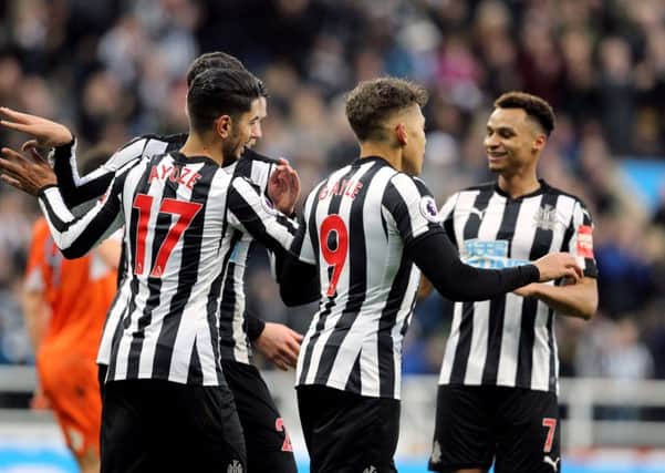 Newcastle United's Ayoze Perez celebrates scoring his side's first goal of the game during the FA Cup, third round match at St James' Park.