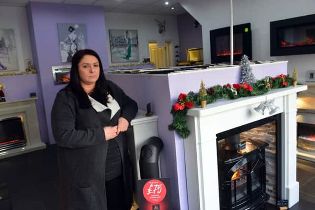 Carolyn McManus of Northern Flame is angry after a council officer and police officer turned up at her business.