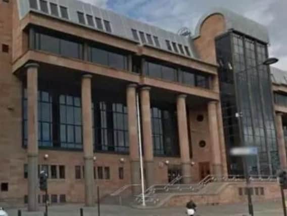 The murder trial is taking place at Newcastle Crown Court.