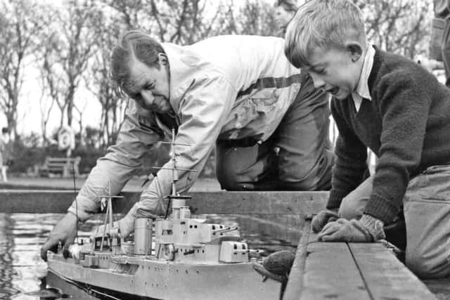 Peter Marley helps launches a model boat in 1962.