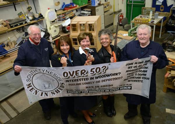 Men In Sheds South Tyneside receive a donation from Newcastle Building Society