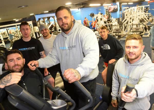 Powerhouse Gym new owner Rhys Iles (middle) is to take a charity 50 mile 24 hour challenge with gym team