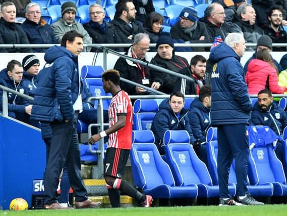 Chris Coleman watches on as Didier Ndong walks off after his red card.