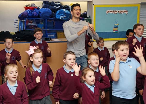 Children dance with Newcastle star Mikel Moreno as part of the Super Movers campaign at Choppington Primary School in Morpeth (Pic: Ian Horrocks/Premier League)
