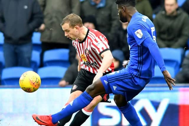 Lee Cattermole battles against Cardiff's Bruno Ecuele Manga in last weekend's 4-0 defeat. Picture by Frank Reid