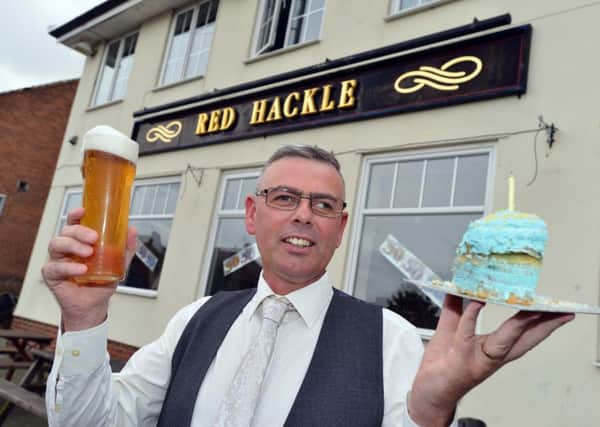 Coun Lee Hughes outside the Red Hackle ahead of it's 50th anniversary