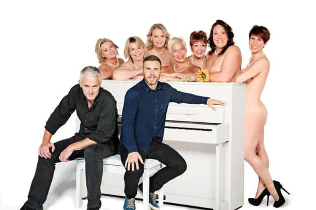Gary Barlow and Tim Firth with the cast of Calendar Girls