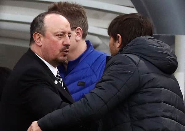 Rafa Benitez with Chelsea boss Antonio Conte yesterday.