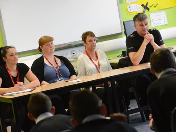 From left, the Gazette's Lisa Nightingale, PC Clare Mallinson, Pat McDougall and Sgt Steve Prested at the knive prevention talk at South Shields Community School.