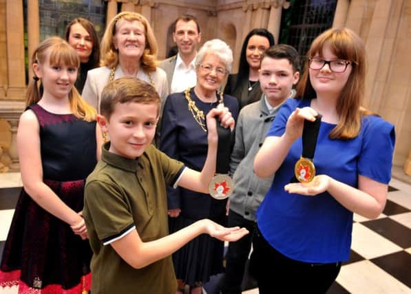 The Mayor Coun Olive Punchion and Mayoress Mrs Mary French with members of South Tyneside Yamaguchi Goju Kai Karate Club, at South Shields Town Hall. Picture by Tim Richardson.