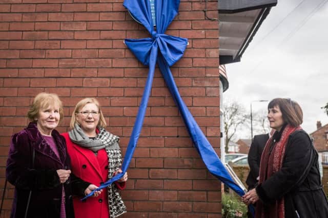 From left to right, Tom Curry's grand-daughters Jennie Dixon, Liz Esser and Jean Wilton unveil a plaque in his honour. Picture by Paul Husband.