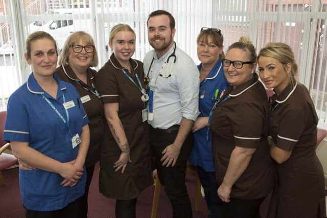 From left to right, staff nurse Kelly Hicks, auxiliary nurses Carole Leithead and Amelia Hambley, Dr Dominic Maxfield, staff nurse Karen Turnbull and auxiliary nurses Susan Pratt and Lisa Hall. who are celebrating the Elder-Friendly Quality Mark.